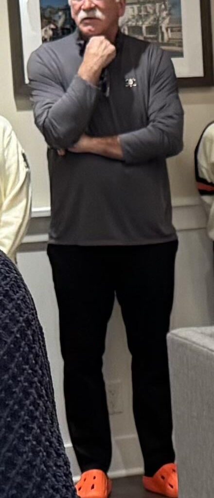 Coach Q rocking the Ryoko Rain clogs