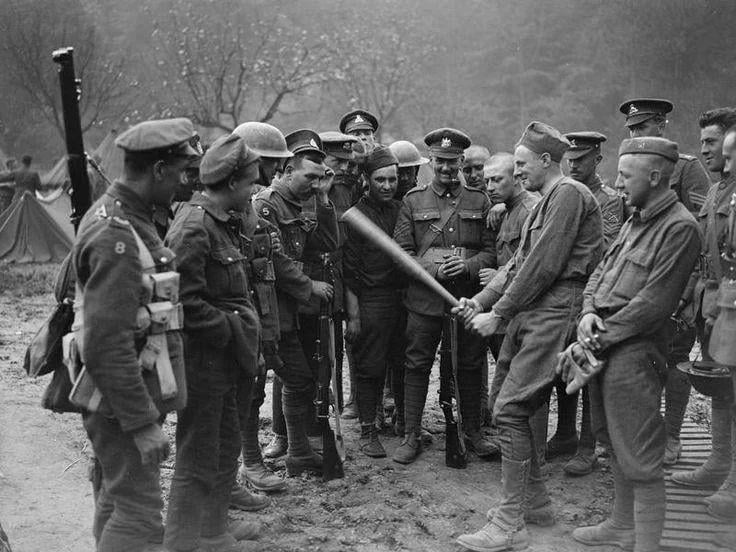 American soldiers explaining to British soldiers what the American game of baseball is like during World War I on May 18, 1918.
