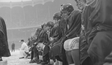 Giants players trying to stay warm on the sidelines against the Cleveland Browns at Yankee Stadium in the Bronx, December 14, 1958