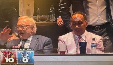 Jerry Jones has to watch his team get thrashed at home with his biggest hater by his side