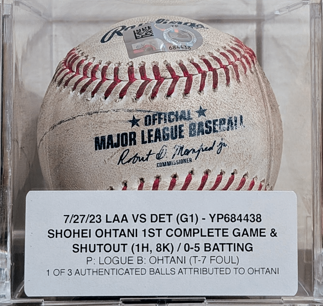 On July 27th 2023, Shohei Ohtani threw his 1st ever career complete game, shutout 1H 8K.  This is an actual authenticated game used baseball attributed to him from the game.