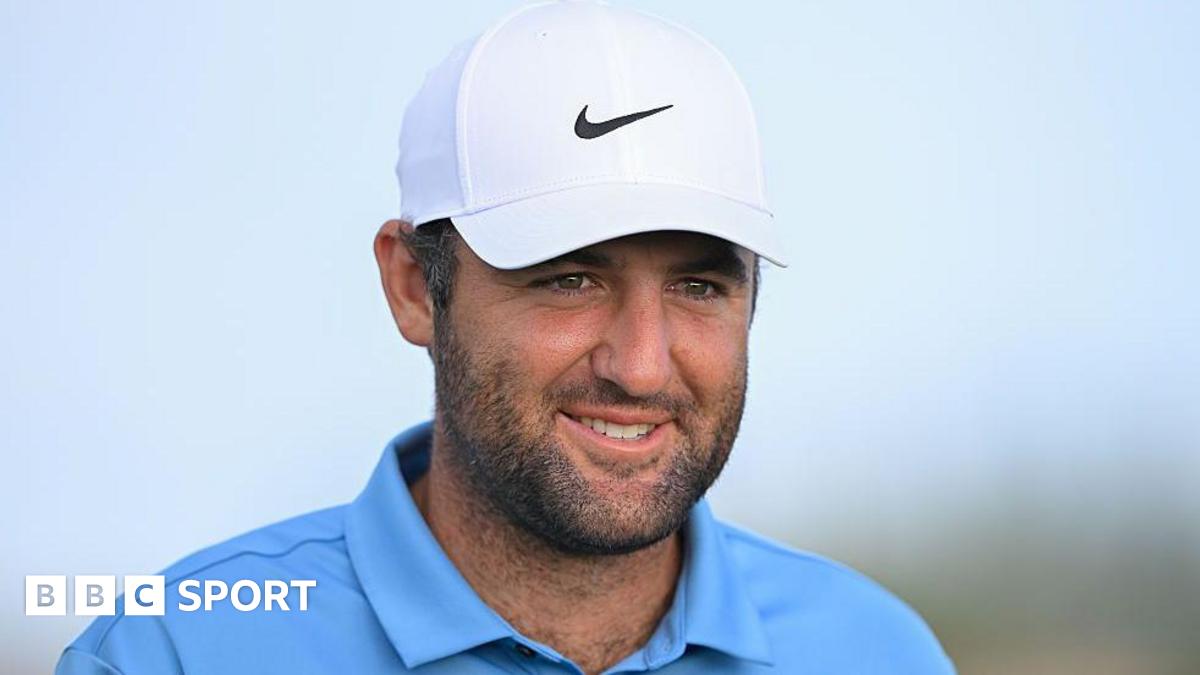 Scottie Scheffler smiles during a round