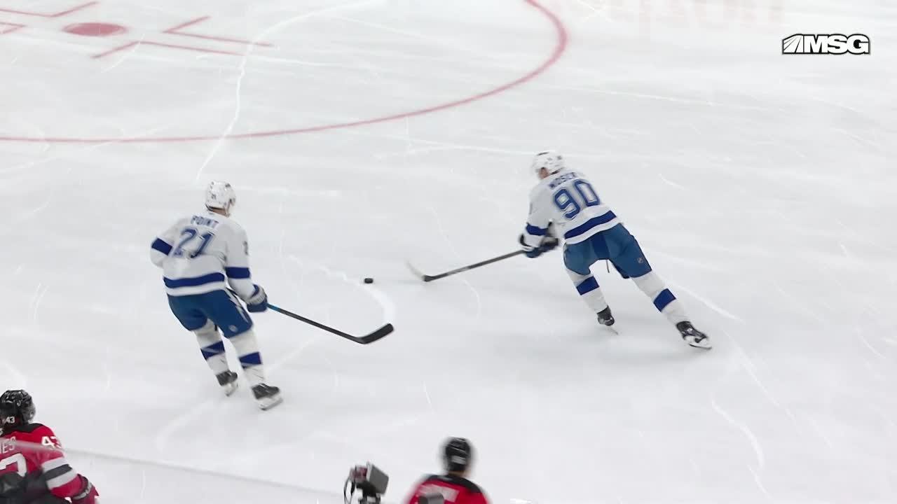 Brayden Point scores a goal against the New Jersey Devils
