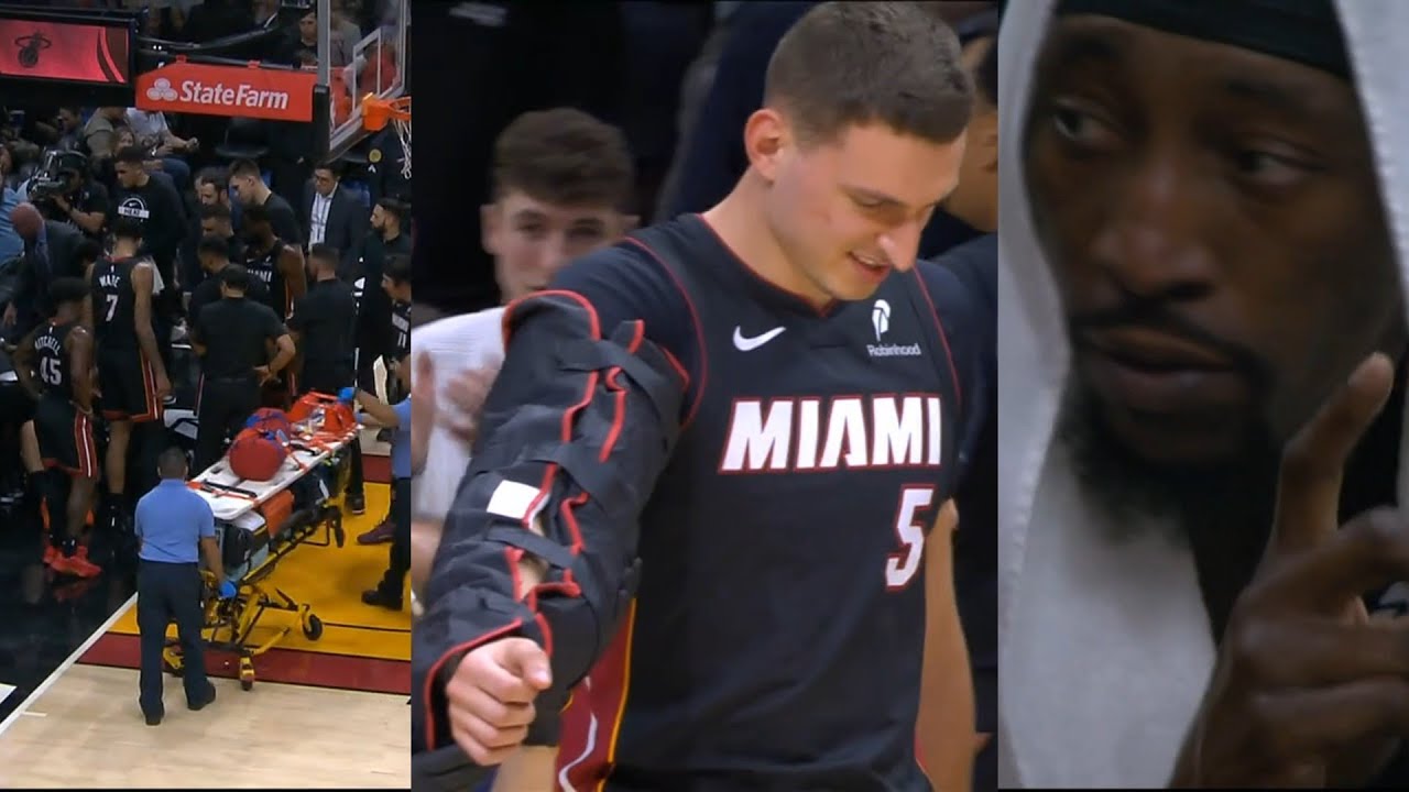 Bam Adebayo prays for Nikola Jovic after hard fall and walks off with arm in brace