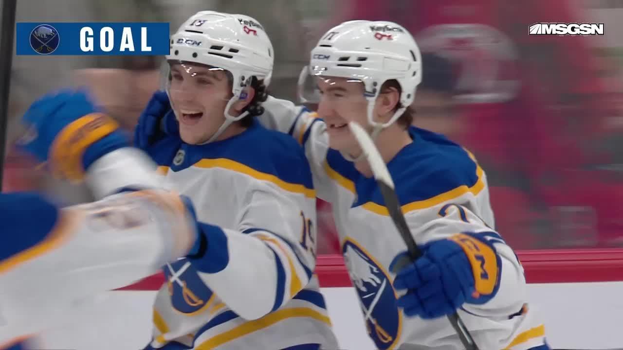 Peyton Krebs scores a goal against the New Jersey Devils