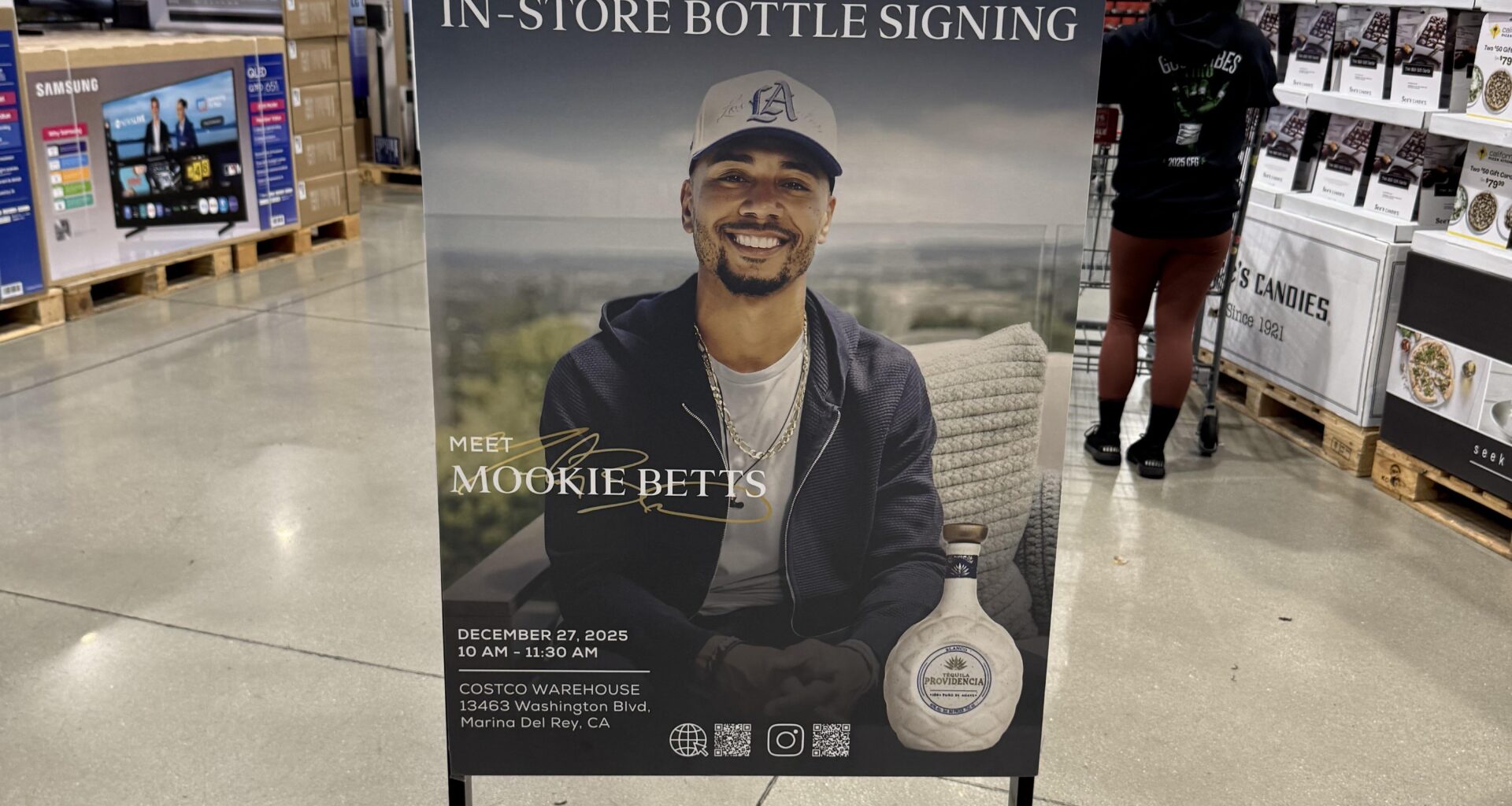 Mookie endorsing tequila at Costco