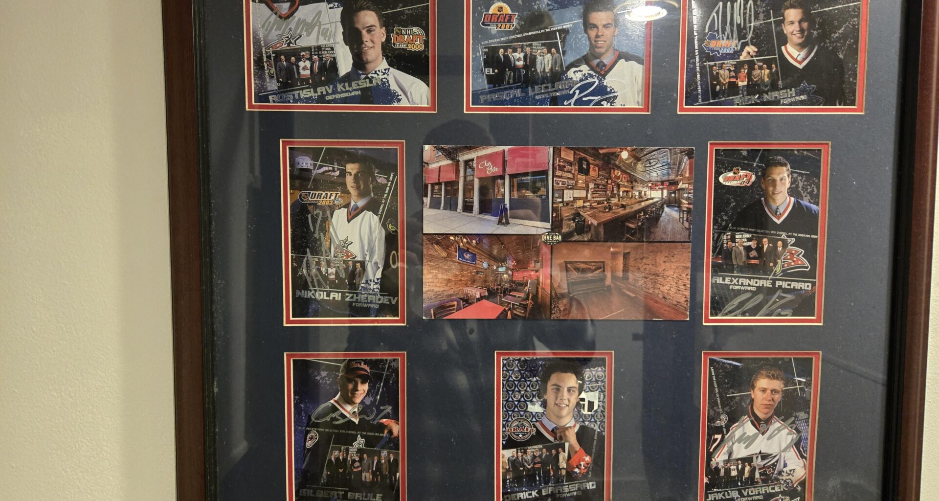 Sign Player Cards in Char Bar Bathroom