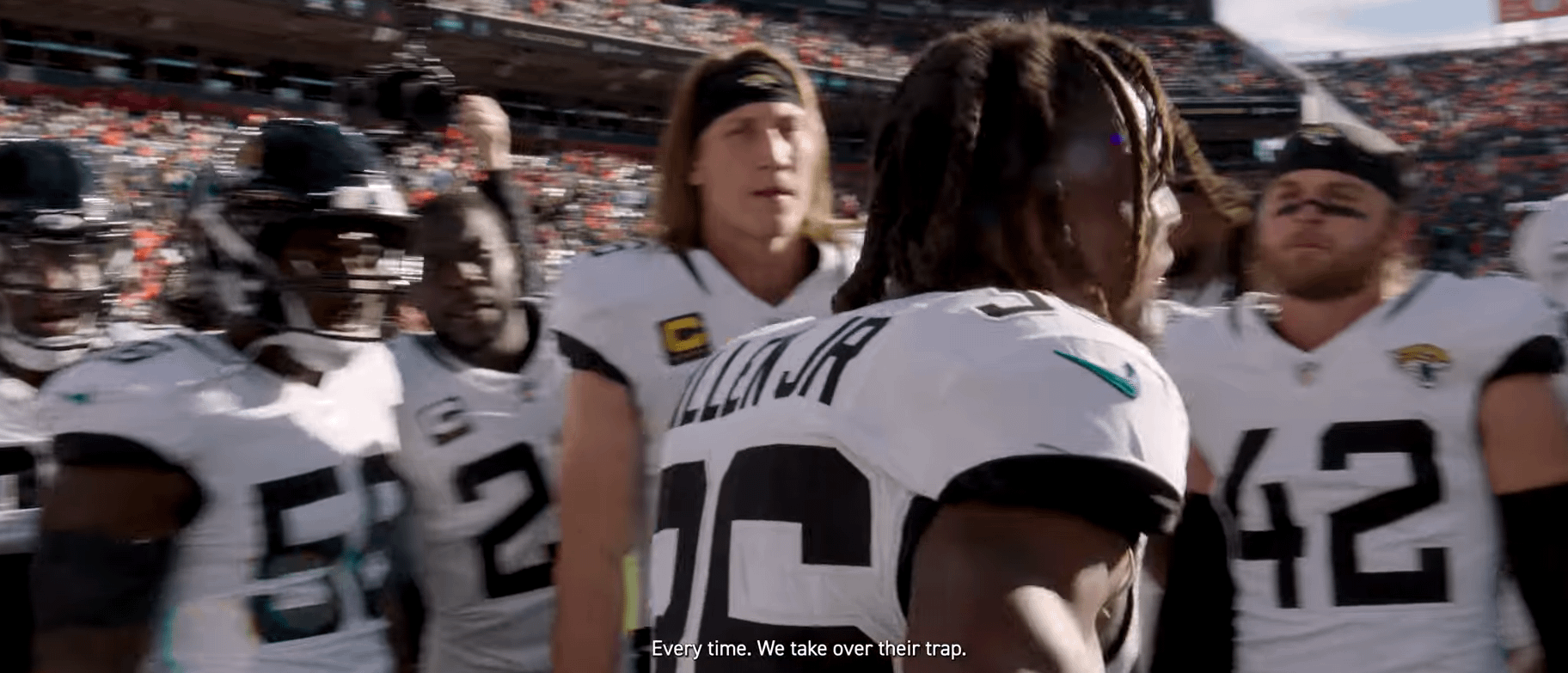 7th round rookie RB leading a huddle before a game
