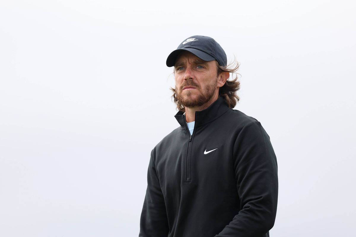Tommy Fleetwood looks on