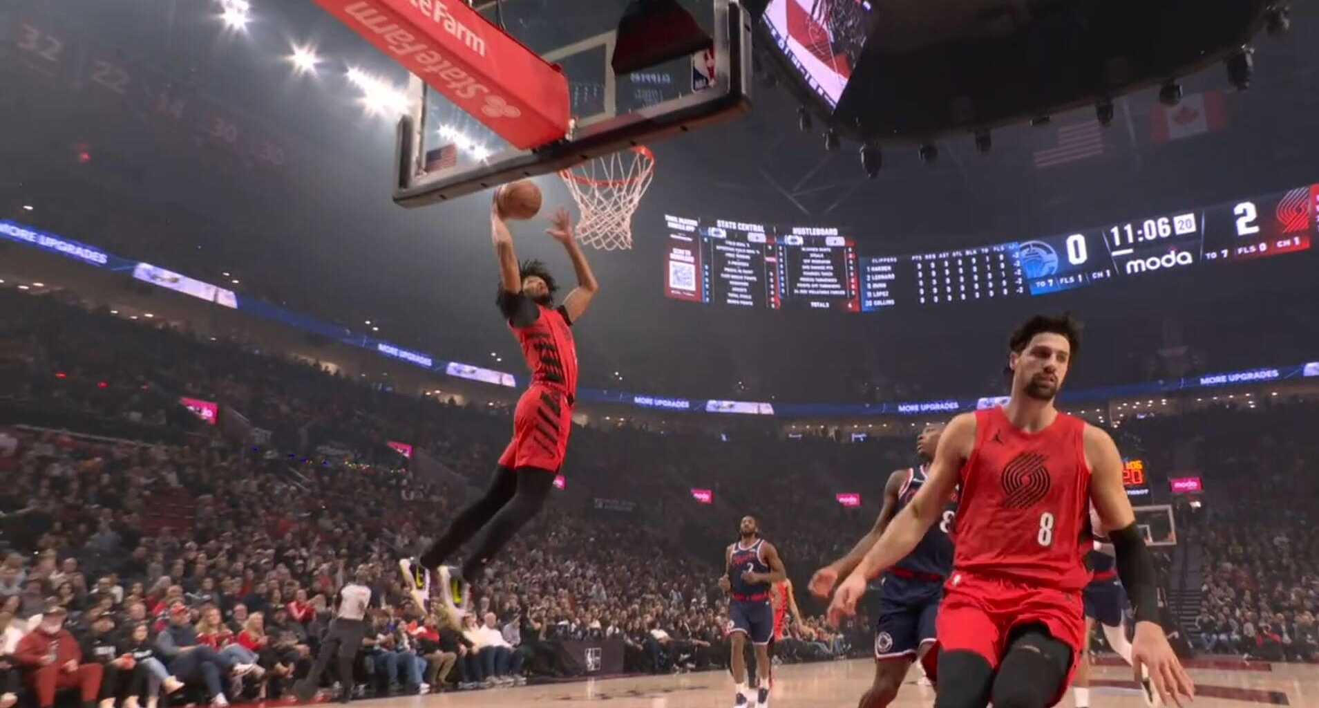 Shaedon Sharpe and Deni Avdija screenshot, after Deni lobs it to Sharpe for the alley-oop dunk. Wade and LeBron iconic picture, sort of.