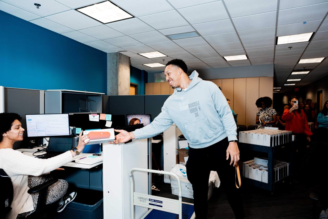 Grant personally hands out gifts to 410 employees