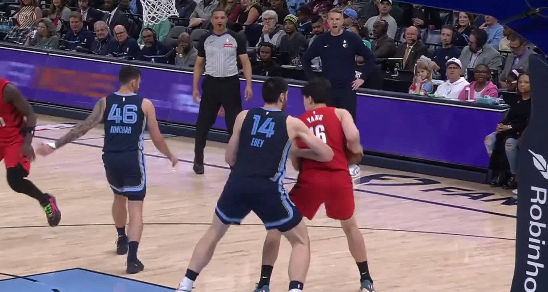 Yang spins baseline on Edey and dunks it!