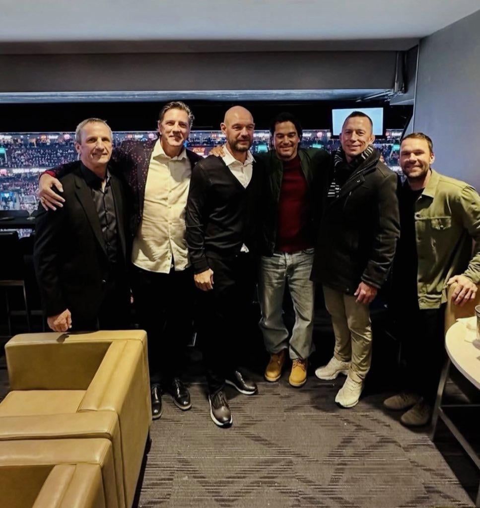 Andrei Markov watching the Habs at the Bell Centre last night with Guy Carbonneau, Patrice Brisebois, José Théodore, Georges St-Pierre and David Desharnais