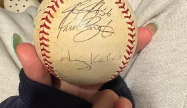 Signature help? Coworker says she got this from the inaugural game at the bank. Thank you!