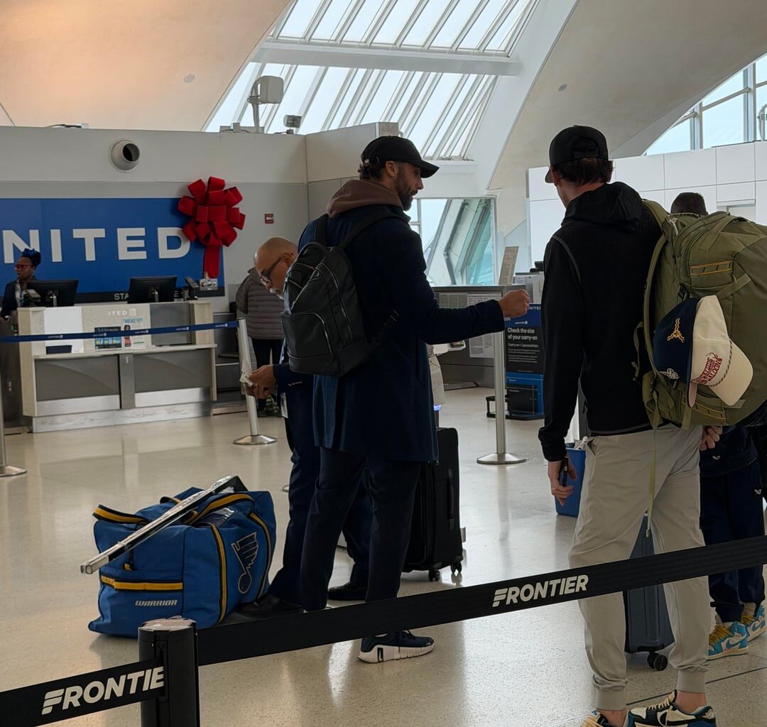 Who did my wife spot at the airport today?