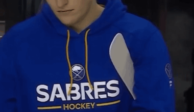 Ukko-Pekka Luukkonen takes a couple nibbles out of a bar, and then proceeds to carefully inspect it, and then wrap it up with a ton of hockey tape.