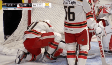 Cossa gets help from his teammate and aspiring equipment manager, Rychlovský, after losing a skate blade