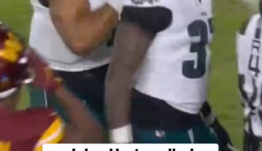 Jalen Hurts snatching his RBs up and out of the brawl.