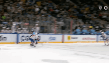 (KHL) Markus Phillips body checks Vitaly Pinchuk into Yegor Zavragin on the bench