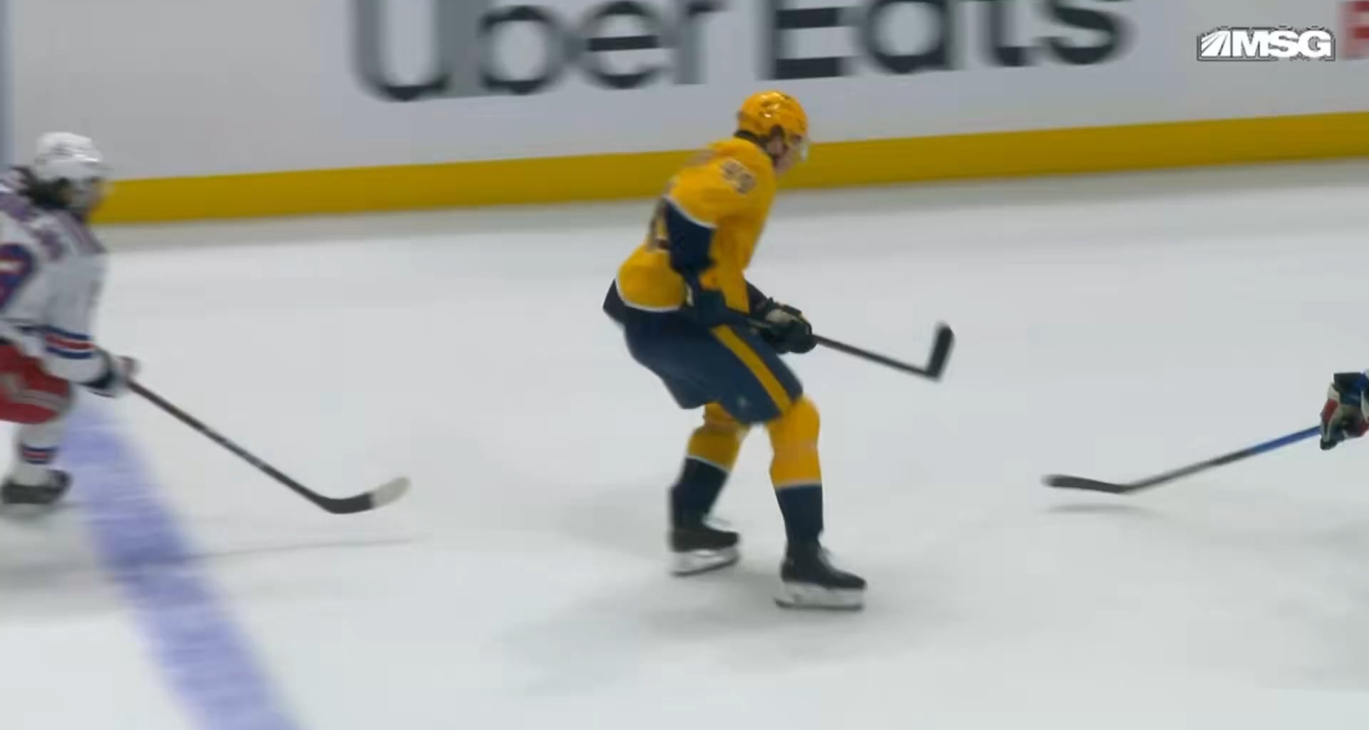 Morrow's skate catches Reid Schaefer on the chin (no blood shown)