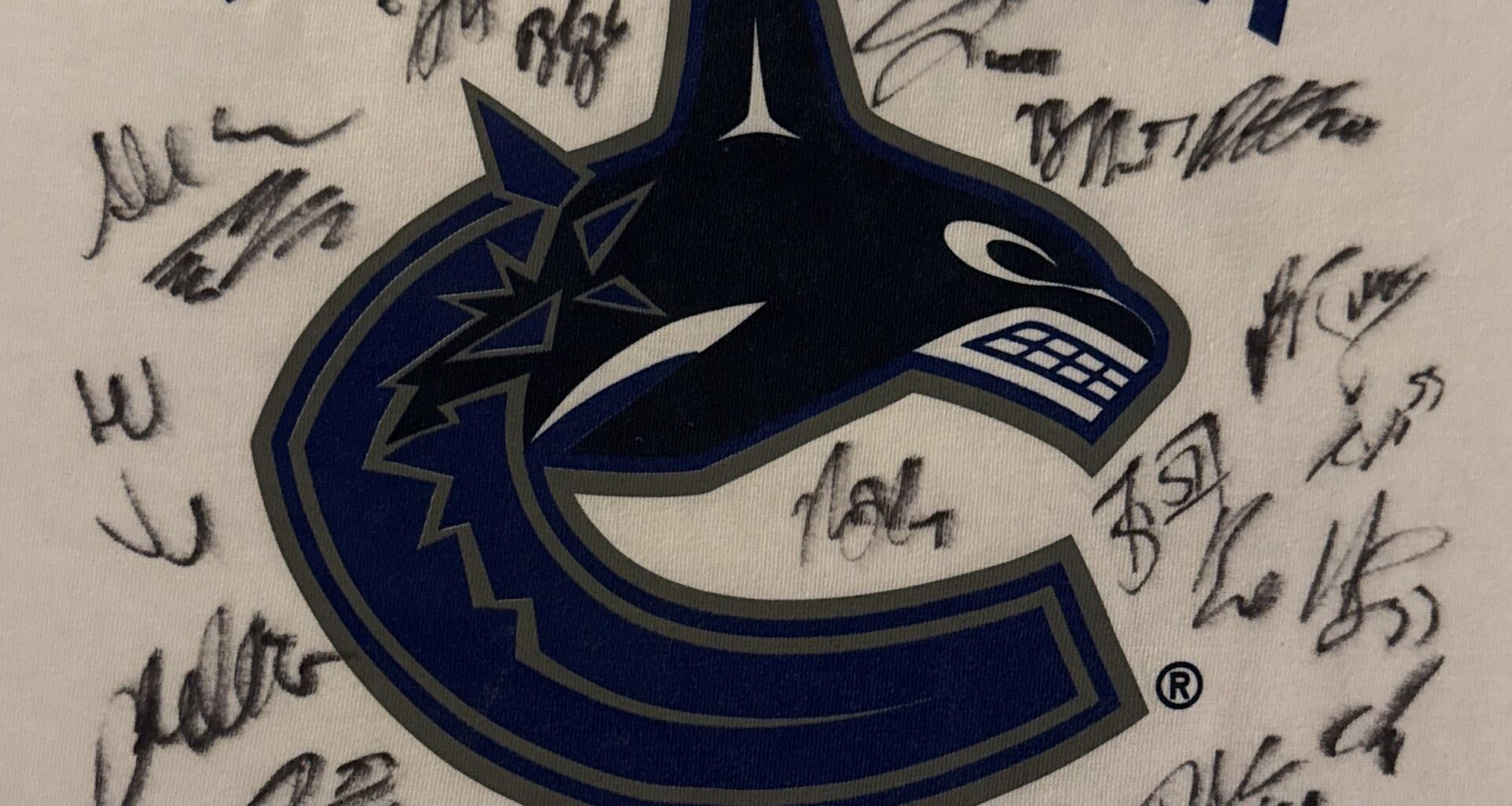 Long Shot - help identifying who signed this shirt