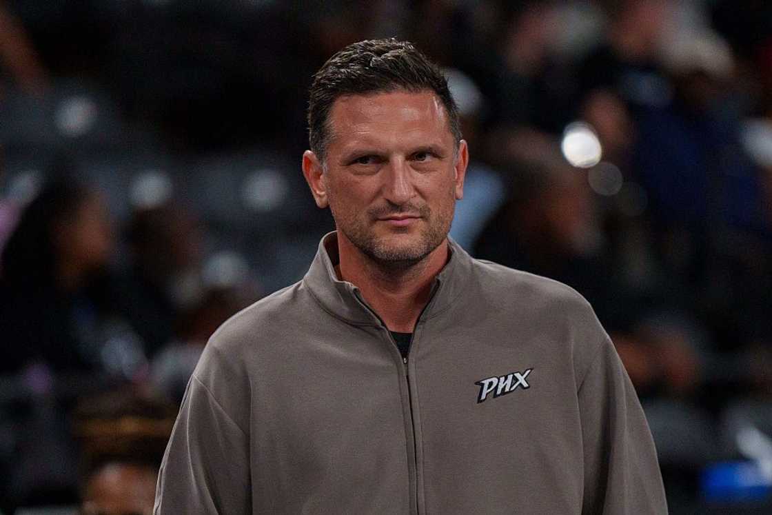 Head Coach Nate Tibbetts of the Phoenix Mercury stands on the sideline before a game at Gateway Centre Arena.