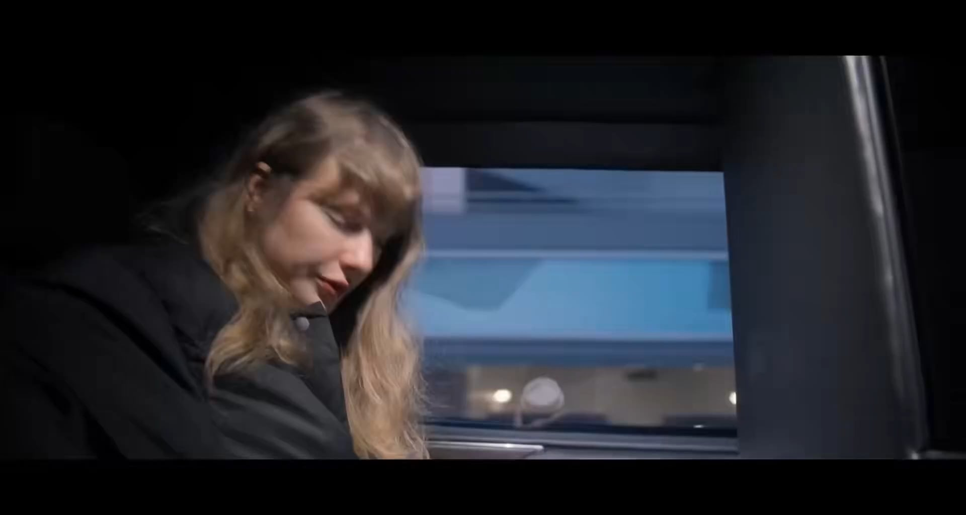 Taylor Swift watching the Chiefs-Chargers game ahead of her final Eras Tour Show in December 2024 (The End of an Era on Disney+)