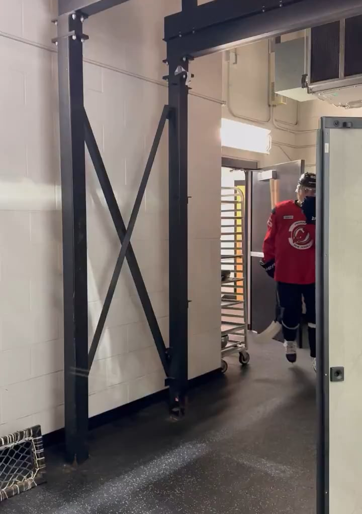 Jack Hughes joins morning skate in a regular jersey