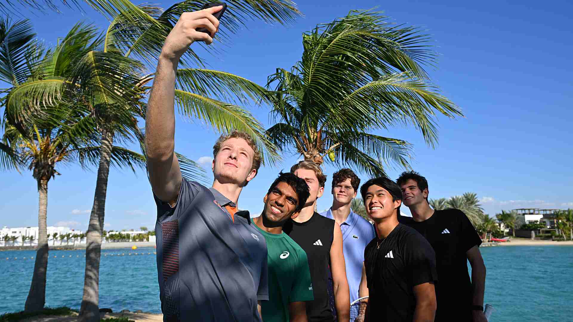 Martin Landaluce, Nishesh Basavareddy, Justin Engel, Alexander Blockx, Learner Tien and Rafael Jodar at the Silver Sands Beach.