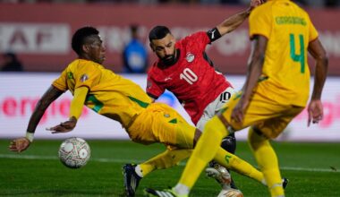 Egypt's Mohamed Salah scores during the Africa Cup of Nations group B soccer match between Egypt and Zimbabwe in Agadir, Morocco, Monday, Dec. 22, 2025. (AP Photo/Mosa'ab Elshamy)