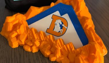 Figured yall would enjoy: 3D printed this customized “mountain” for our favorite dice game. RoF members printed on the bottom.