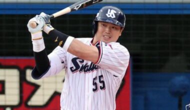 Why do NPB players uniforms have their team names in English?