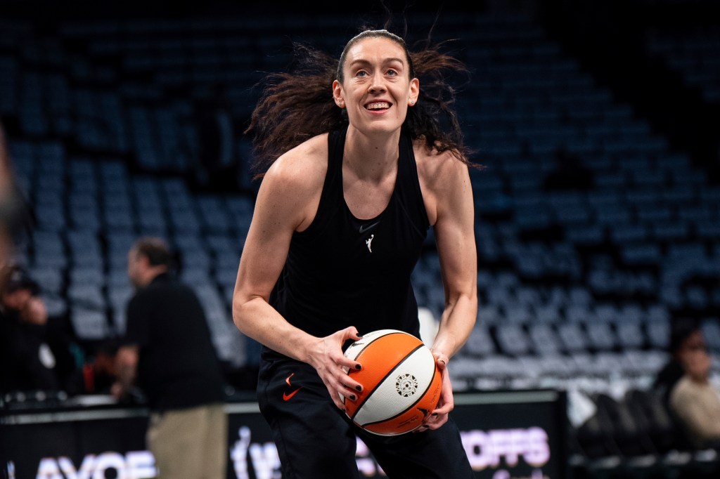 Breanna Stewart of the New York Liberty warms up with a basketball.