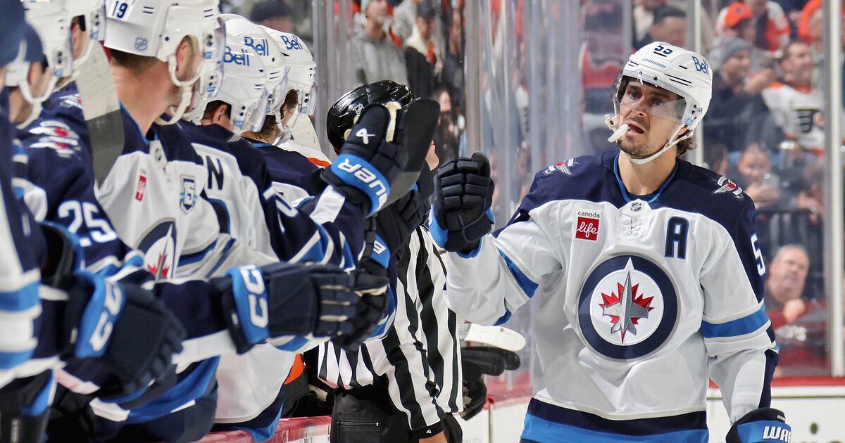 Two-time Olympian Toews says Jets teammate Scheifele should wear Maple Leaf in Milan