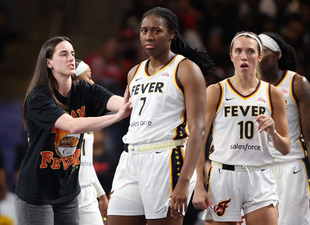 Caitlin Clark converses with Aliyah Boston against the Atlanta Dream 