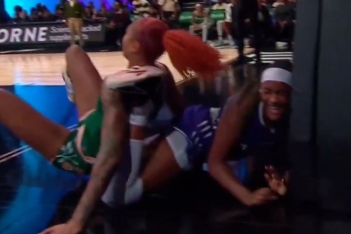 Aaliyah Edwards hits into the base of the basket