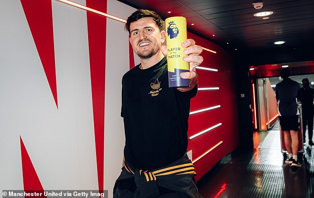 Maguire walks down the tunnel with his Premier League Player of the Match award