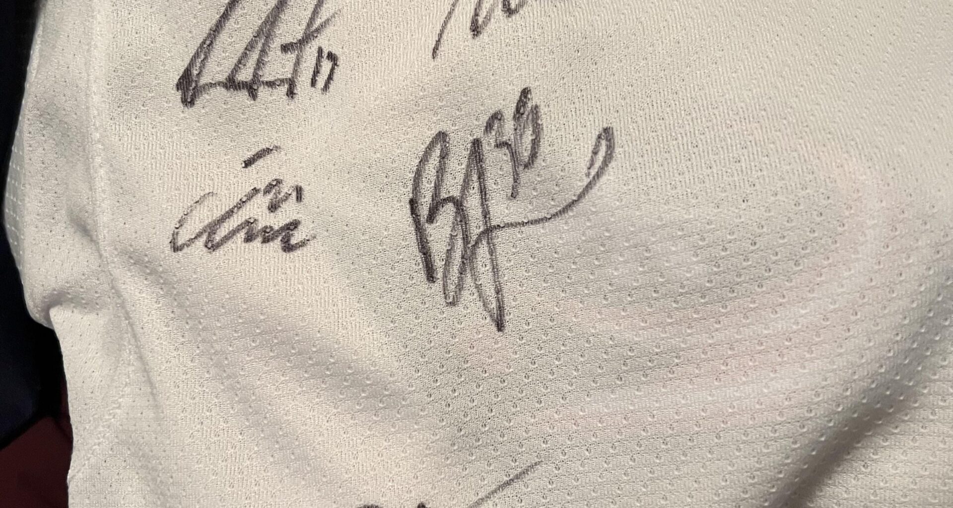 Tiny jersey, big signatures