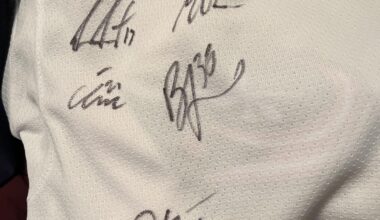 Tiny jersey, big signatures