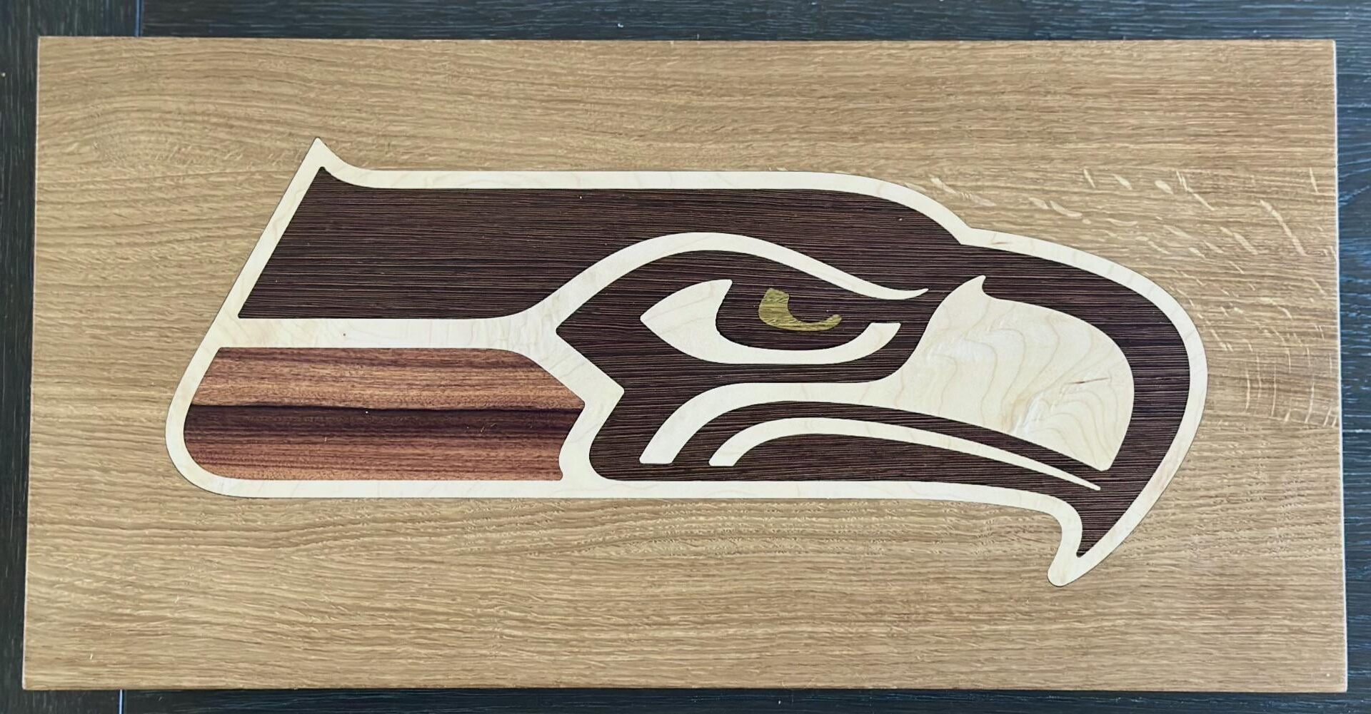 [OC] Made this wooden Seahawks logo inlay for my wife today. Congrats on the bye.