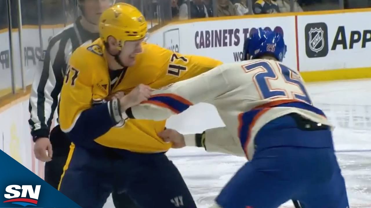 Oilers' Darnell Nurse And Predators' Michael McCarron Square Off After Opening Puck Drop