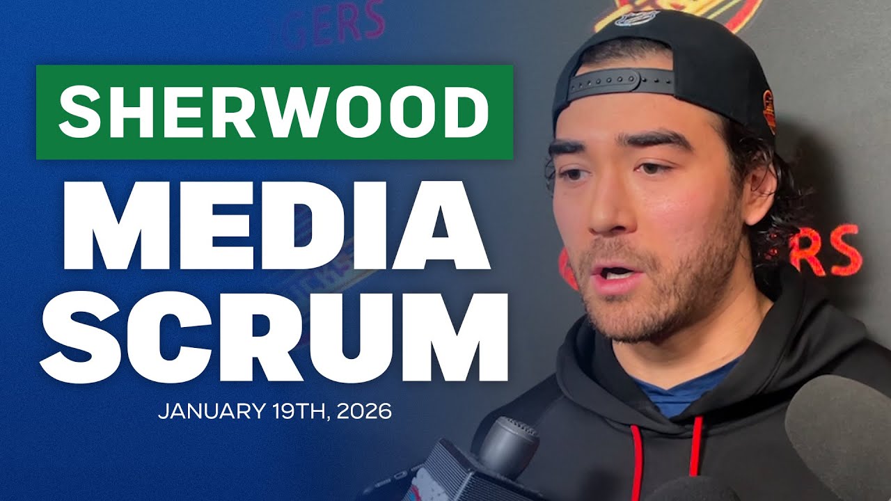 Canucks’ Kiefer Sherwood speaks with media after being traded to the San Jose Sharks