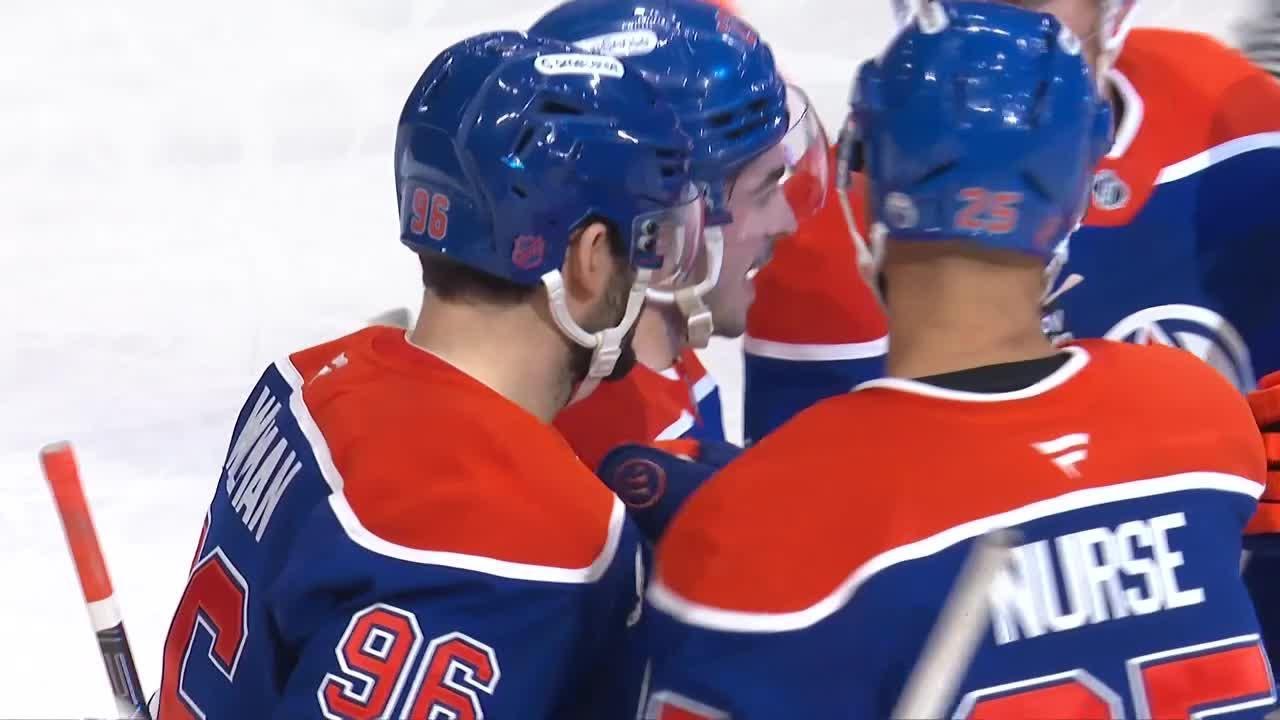 Matt Savoie scores a goal against the New Jersey Devils