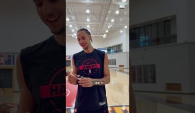 Zacch sees his first-ever bobblehead! #nba #hawks #zaccharierisacher #bobblehead