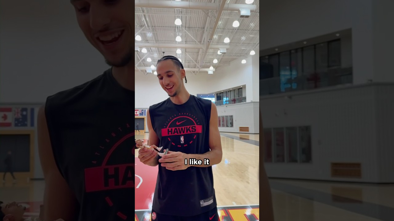 Zacch sees his first-ever bobblehead! #nba #hawks #zaccharierisacher #bobblehead