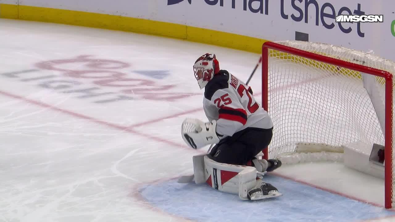 Matty Beniers scores a goal against the New Jersey Devils