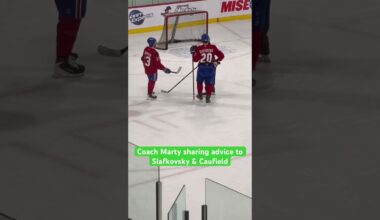Coach Marty sharing advice to Slafkovsky & Caufield