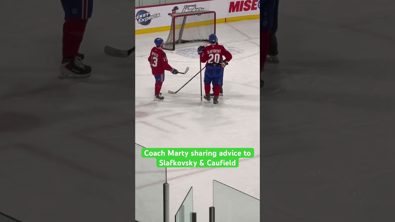 Coach Marty sharing advice to Slafkovsky & Caufield