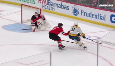 Nico Hischier scores a goal against the Nashville Predators