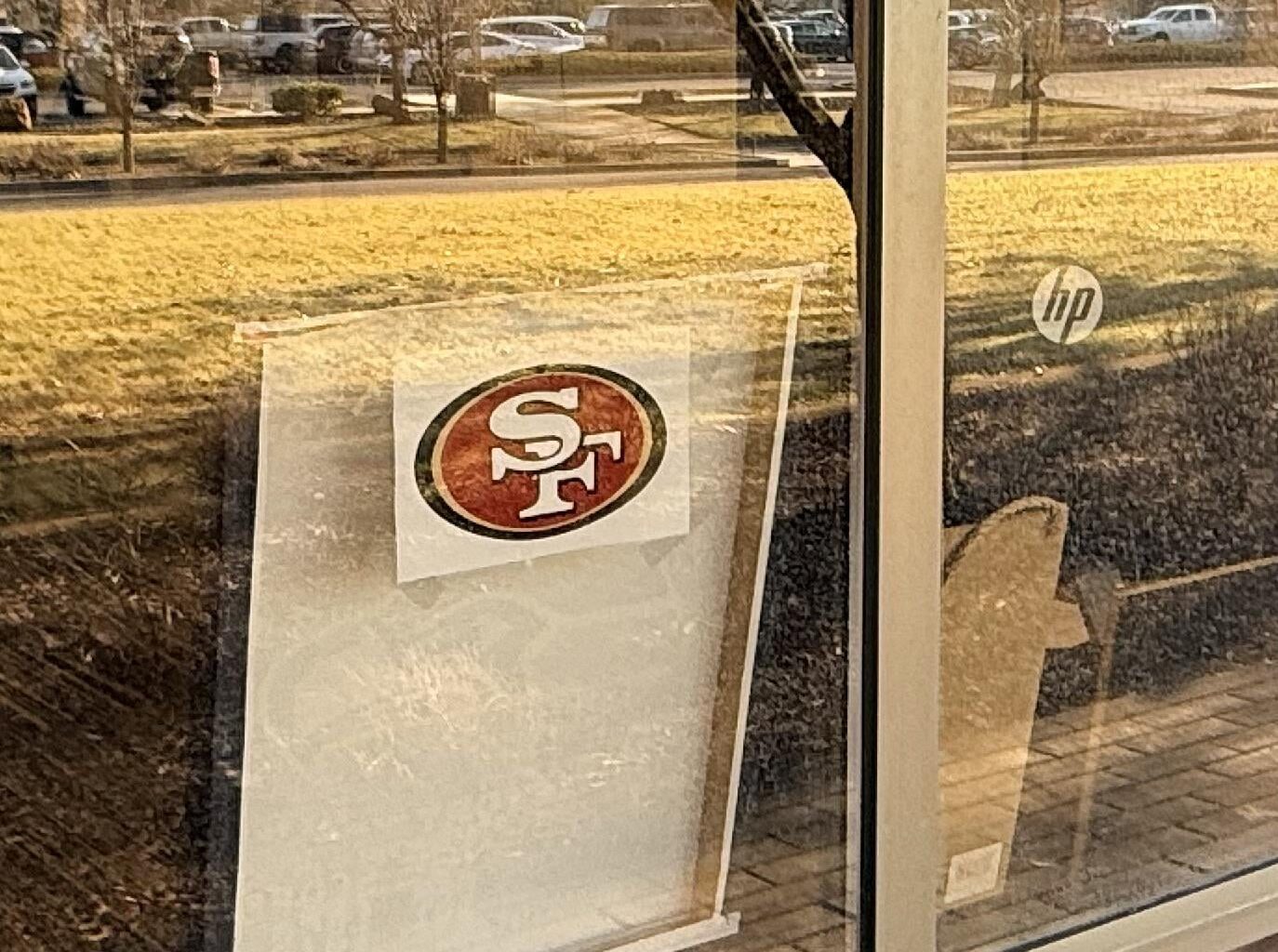 I put this in my boss’s office window. He’s a die hard Seahawks fan.